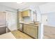 Updated kitchen with stainless steel appliances, light wood cabinets and light countertops at 11568 Westwood Blvd # 1021, Orlando, FL 32821