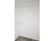 Empty closet features wood floors and multiple wire shelves at 11847 Ocklawaha Dr, Leesburg, FL 34788