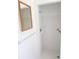 Clean shower with white tile, grab bar, and shower accessories at 11847 Ocklawaha Dr, Leesburg, FL 34788