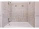 Bathroom showcases tiled shower walls and a bathtub with tiled wall details at 1367 Saddleridge Dr, Orlando, FL 32835