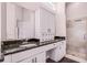Bathroom boasts a large vanity, granite counters, drawers, and glass-enclosed shower at 1367 Saddleridge Dr, Orlando, FL 32835