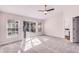 Bedroom with vaulted ceilings, ceiling fan, and access to the outdoor patio at 1367 Saddleridge Dr, Orlando, FL 32835