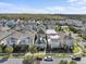Aerial view of a neighborhood showing homes, landscaping, and streets at 14165 Moniz Ave, Orlando, FL 32827