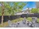 A cozy deck featuring patio furniture, shed, and a well-maintained yard at 1517 E Esther St, Orlando, FL 32806