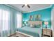 Serene bedroom with soft lighting, comfortable bedding, and stylish window treatments at 159 Captiva Dr, Davenport, FL 33896