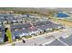 Aerial view of townhomes with private, screened-in pools, conveniently located near parking and community amenities at 2636 Reading Trl, Kissimmee, FL 34746