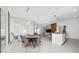 Inviting open-concept dining area, seamlessly flowing from kitchen to living spaces at 2636 Reading Trl, Kissimmee, FL 34746
