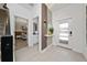 Welcoming entryway with staircase and decorative wall accents leading to other rooms at 2636 Reading Trl, Kissimmee, FL 34746