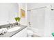 Clean bathroom featuring a vanity, framed mirror, and a shower with a tub at 2661 Petition Ln, Kissimmee, FL 34746