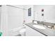 Clean bathroom featuring a vanity, framed mirror, and a shower with a tub at 2661 Petition Ln, Kissimmee, FL 34746