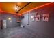 Finished garage showcasing basketball theme, epoxy floors, and LED lighting at 2661 Petition Ln, Kissimmee, FL 34746
