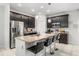 Modern kitchen with granite countertops, stainless steel appliances, and a breakfast bar at 2706 Rowan St, Tavares, FL 32778