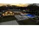 Expansive outdoor living area featuring a swimming pool, fire pit, and multiple seating areas, perfect for entertaining at 2844 Marquesas Ct, Windermere, FL 34786