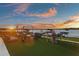Backyard with outdoor seating, perfect for enjoying lake views at sunset at 2844 Marquesas Ct, Windermere, FL 34786
