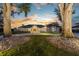 Elegant home with paver driveway, lush landscaping, and beautiful sunset views at 2844 Marquesas Ct, Windermere, FL 34786