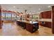 Gourmet kitchen with large island, stainless steel appliances, and waterfront views at 2844 Marquesas Ct, Windermere, FL 34786