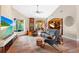 Open living area featuring hardwood floors, lake views, and stylish furniture at 2844 Marquesas Ct, Windermere, FL 34786