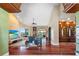 Comfortable living room with lake view, hardwood floors, and designer furnishings at 2844 Marquesas Ct, Windermere, FL 34786