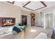 Spacious bathroom has soaking tub with fireplace and access to shower with an open layout for a spa like experience at 2844 Marquesas Ct, Windermere, FL 34786