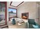 Relaxing main bathroom includes a soaking tub, fireplace, and a large window with natural light for a tranquil atmosphere at 2844 Marquesas Ct, Windermere, FL 34786