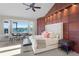 Beautiful main bedroom offers lake views, a charming breakfast nook, and custom wood detailing for added character at 2844 Marquesas Ct, Windermere, FL 34786