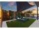 Outdoor patio area with lounge chairs, decorative bicycle planter, and waterfront views at 2844 Marquesas Ct, Windermere, FL 34786