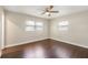 Serene bedroom with hardwood floors, neutral walls, and natural light, offering a relaxing retreat at 3434 Se 12Th St, Ocala, FL 34471