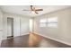 Comfortable bedroom features hardwood floors, closet space, and natural light, creating a peaceful sanctuary at 3434 Se 12Th St, Ocala, FL 34471