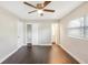 Spacious bedroom includes a ceiling fan, closet, hardwood floors and an en-suite bathroom at 3434 Se 12Th St, Ocala, FL 34471