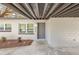 Inviting home featuring a freshly painted white brick facade, with a gray front door at 3434 Se 12Th St, Ocala, FL 34471
