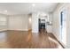 Open-concept living space flows into the kitchen, featuring modern finishes and plenty of natural light at 3434 Se 12Th St, Ocala, FL 34471