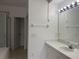 Bathroom with shower and tub, vanity, and large mirror at 373 Caribbean Dr, Davenport, FL 33897