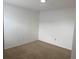 Neutral bedroom with beige carpeting and white walls at 373 Caribbean Dr, Davenport, FL 33897