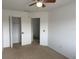 Bedroom with closet and open doorway at 373 Caribbean Dr, Davenport, FL 33897
