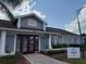 Charming church building with brick-lined walkway, clear signage, and well-maintained landscaping at 373 Caribbean Dr, Davenport, FL 33897