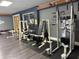 Community gym features weights, machines, and a modern interior at 373 Caribbean Dr, Davenport, FL 33897