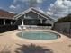 Community hot tub with a fenced perimeter at 373 Caribbean Dr, Davenport, FL 33897