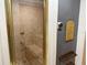A tiled steam room with a built-in bench for relaxation and wellness at 373 Caribbean Dr, Davenport, FL 33897