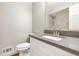 This newly remodeled bathroom features a stone countertop and tile shower at 4429 Rossmore Dr, Orlando, FL 32810