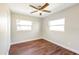 Bedroom with wood floors and a ceiling fan at 4429 Rossmore Dr, Orlando, FL 32810