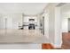Modern kitchen with white cabinets, stainless steel appliances, and center island at 4429 Rossmore Dr, Orlando, FL 32810