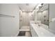 Beautifully renovated bathroom featuring a walk-in shower with modern fixtures and a vanity at 450 Windmill Palm Cir, Altamonte Springs, FL 32701