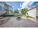 Outdoor fire pit area with seating, ideal for gatherings and relaxing evenings at 450 Windmill Palm Cir, Altamonte Springs, FL 32701