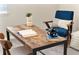 Cozy home office space with a wooden desk, stylish chair, and decorative accents at 450 Windmill Palm Cir, Altamonte Springs, FL 32701