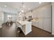 Modern kitchen with stainless steel appliances, a center island with bar seating, and pendant lighting at 450 Windmill Palm Cir, Altamonte Springs, FL 32701