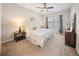 Serene main bedroom suite featuring soft carpet, lots of light, and a ceiling fan at 450 Windmill Palm Cir, Altamonte Springs, FL 32701