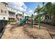 Community playground with a slide and climbing structure, perfect for families at 450 Windmill Palm Cir, Altamonte Springs, FL 32701