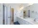 Bright bathroom featuring double sinks, ample counter space, and modern fixtures at 4507 Monado Dr, Kissimmee, FL 34746