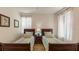 Comfortable bedroom featuring two twin beds, neutral colors and bright natural light at 4507 Monado Dr, Kissimmee, FL 34746