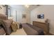 Comfortable bedroom features a large bed, dresser, and wall-mounted TV at 4507 Monado Dr, Kissimmee, FL 34746